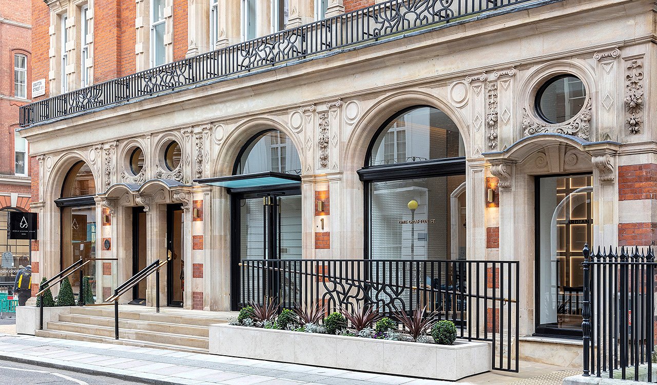 Refurbished street frontage of 1 Grafton Street in Mayfair, London showing restored historic façade and elegant design