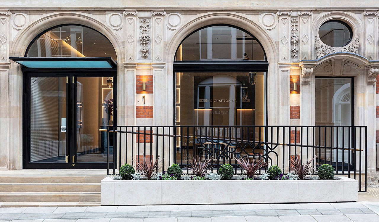 Refurbished street frontage of 1 Grafton Street in Mayfair, London showing restored historic façade and elegant design
