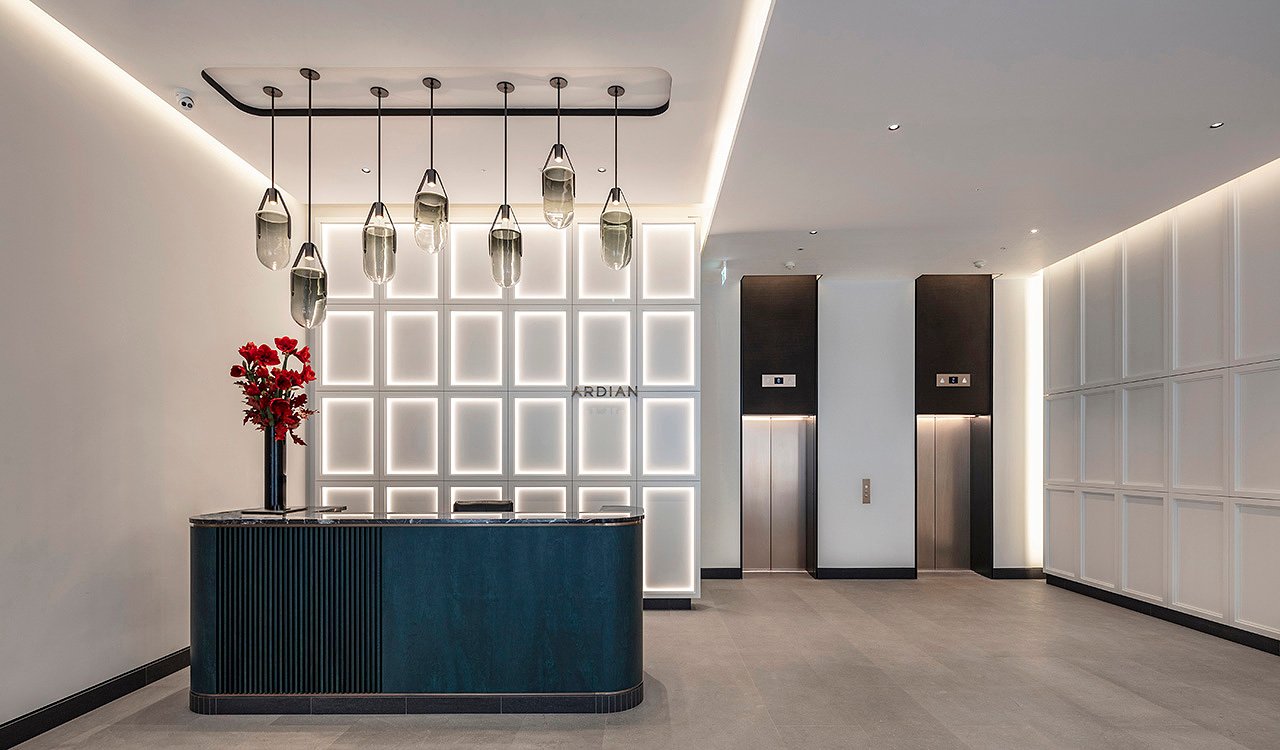 Refurbished street frontage of 1 Grafton Street in Mayfair, London showing restored historic façade and elegant design