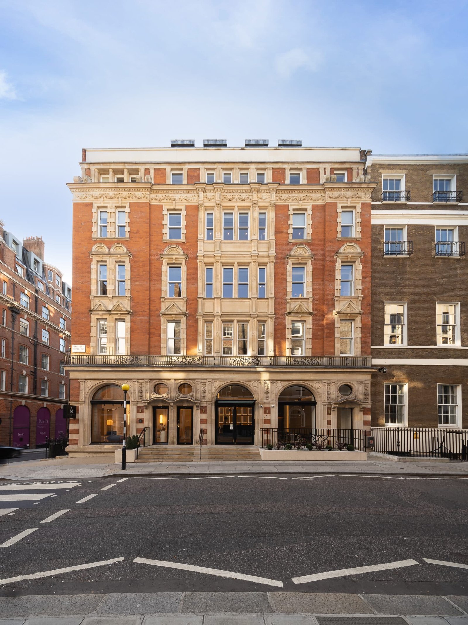 Refurbished street frontage of 1 Grafton Street in Mayfair, London showing restored historic façade and elegant design