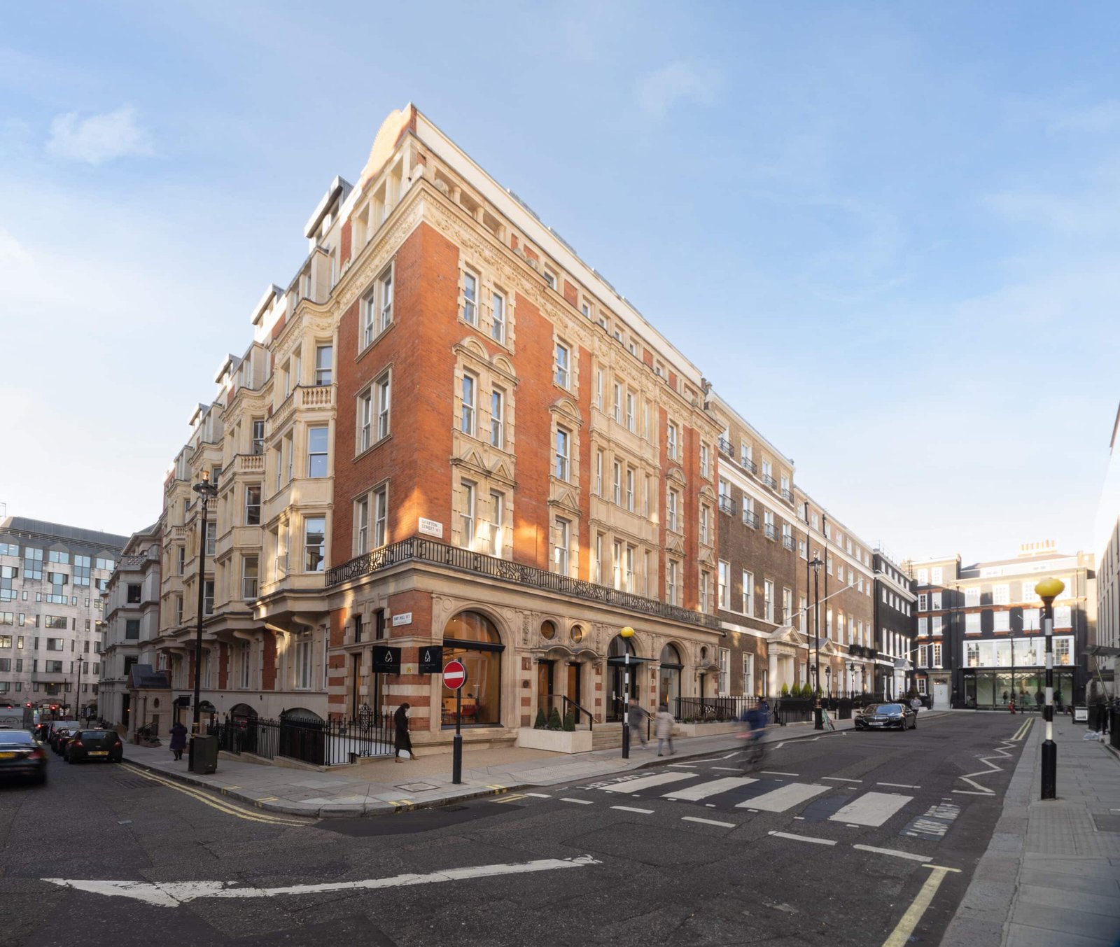 Refurbished street frontage of 1 Grafton Street in Mayfair, London showing restored historic façade and elegant design